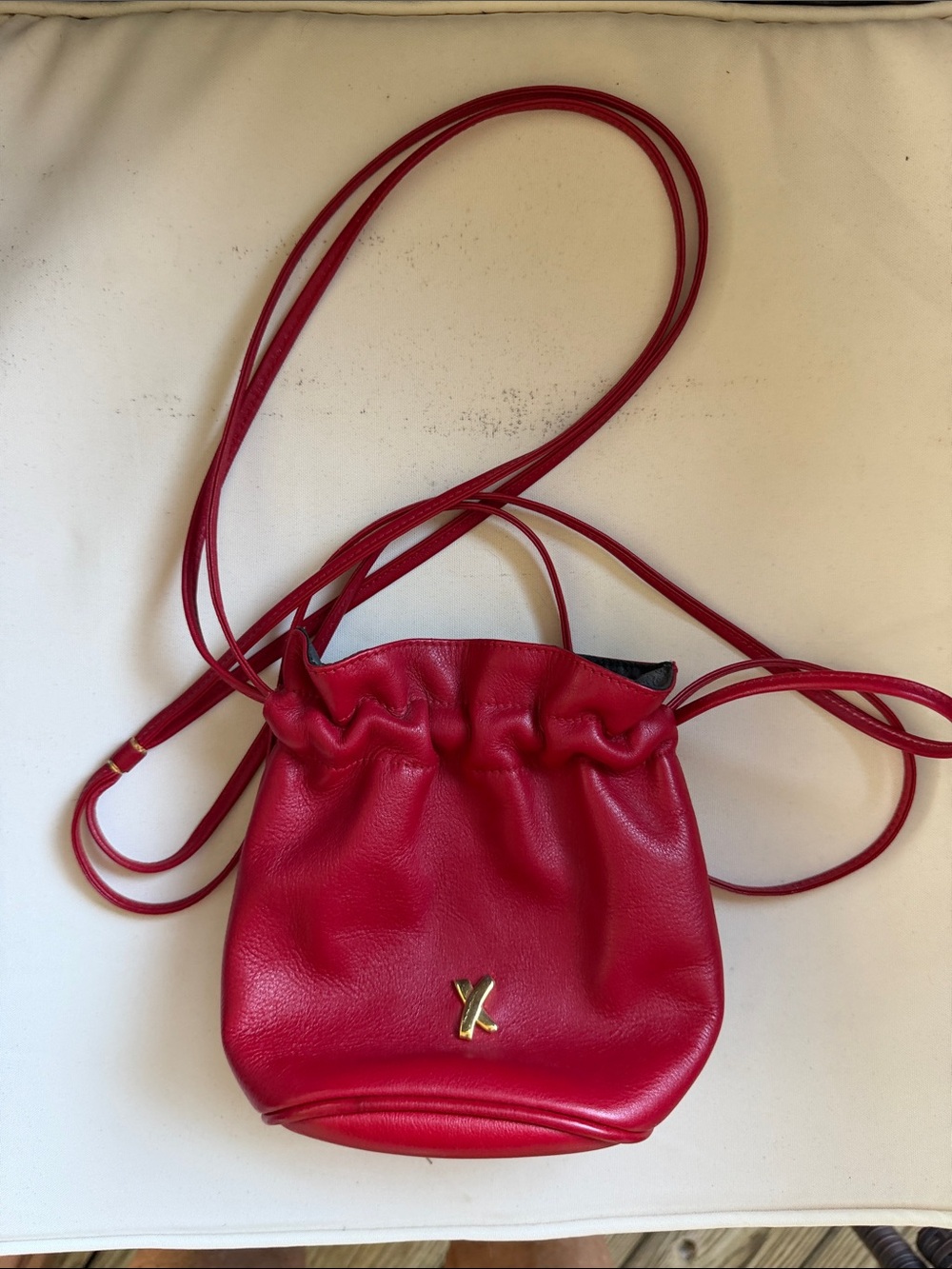 Red Mini Drawstring Crossbody Bag with Gold 'Y' Accent